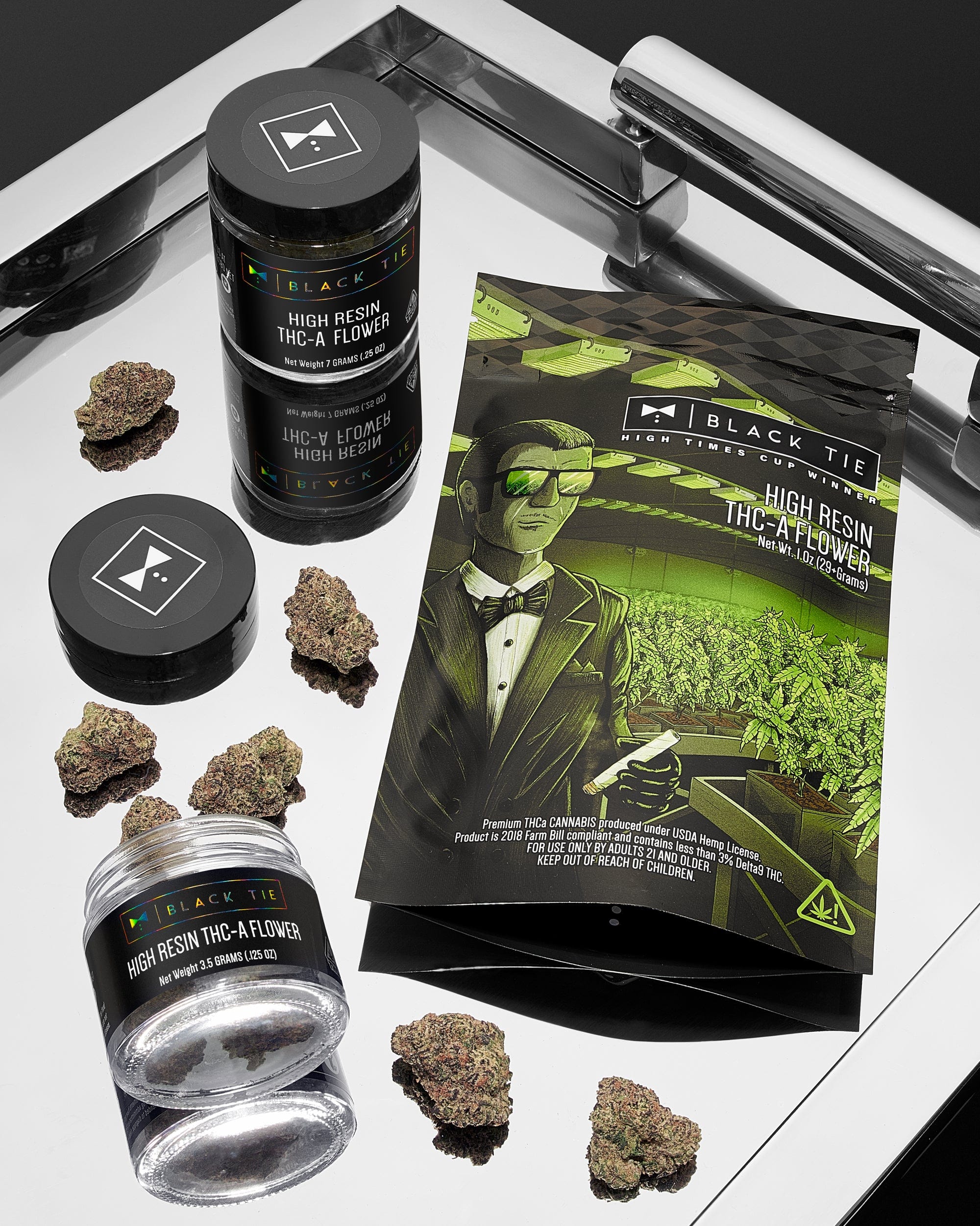 Black_Tie_-_Archive_Runtz_flower_creative_shot_with_butler_tray_feature_8th_7_gram_and_mylar_bag